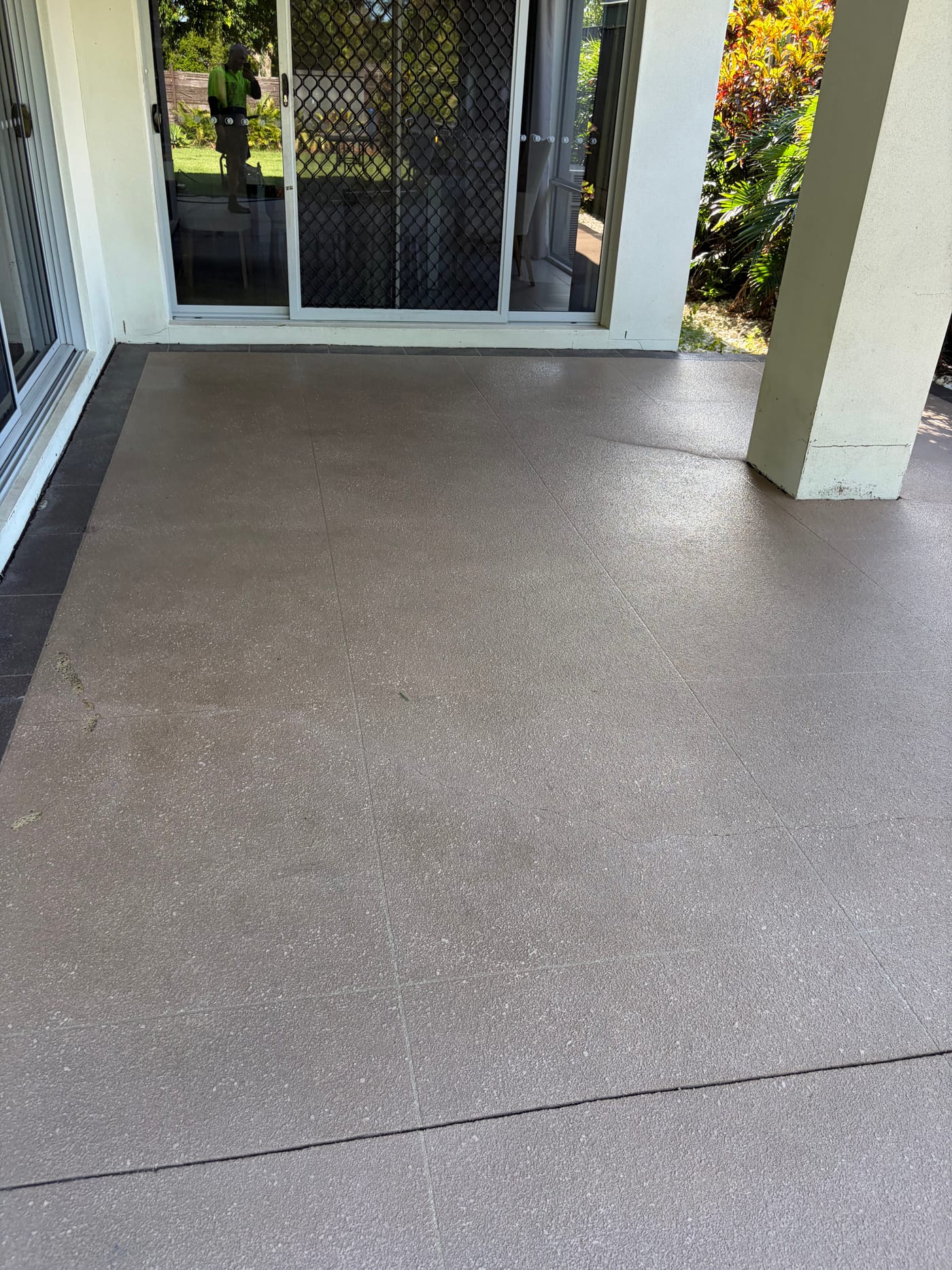 Gold Coast covered alfresco patio cleaning result on a concrete slab